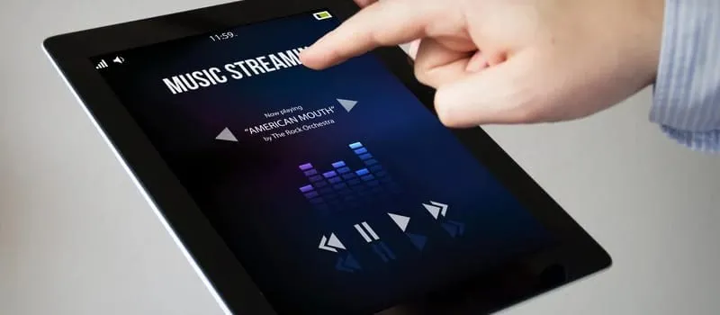 Pilih Mana? Spotify atau Apple Music untuk Pecinta Musik Sejati