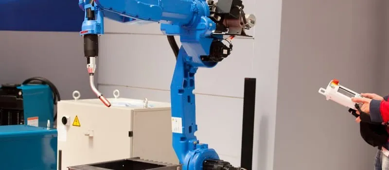 Bagaimana AI dan IoT Memperkuat Industrial Robotics Integration?